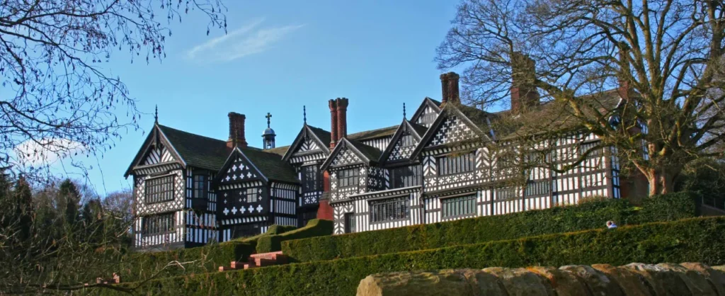Black and white timber framed Tudor manor house of Bramall Hall in Bramhall Park