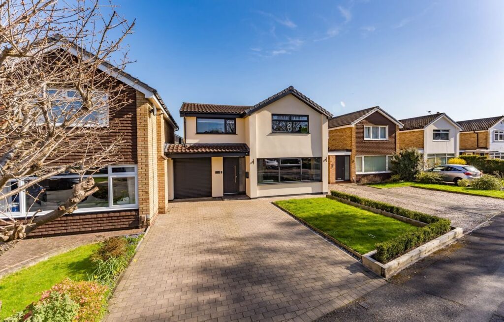 Detached house with driveway and front lawn on Dickens Close, Cheadle Hulme